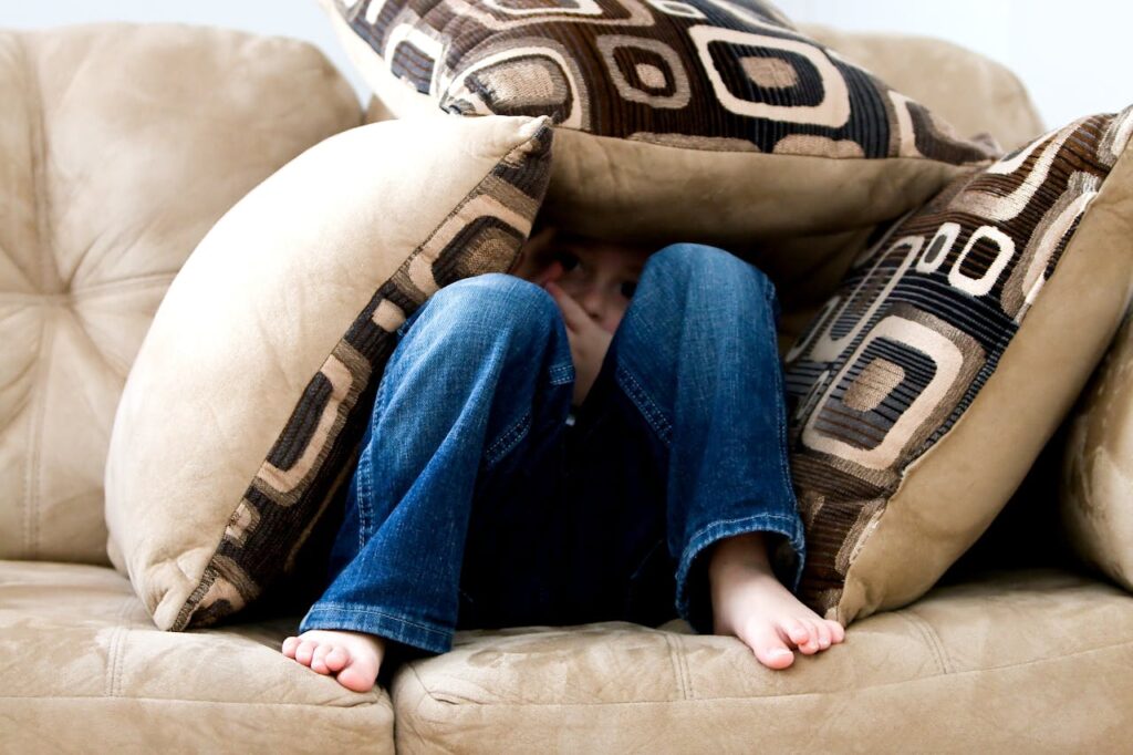 child on couch child on couch